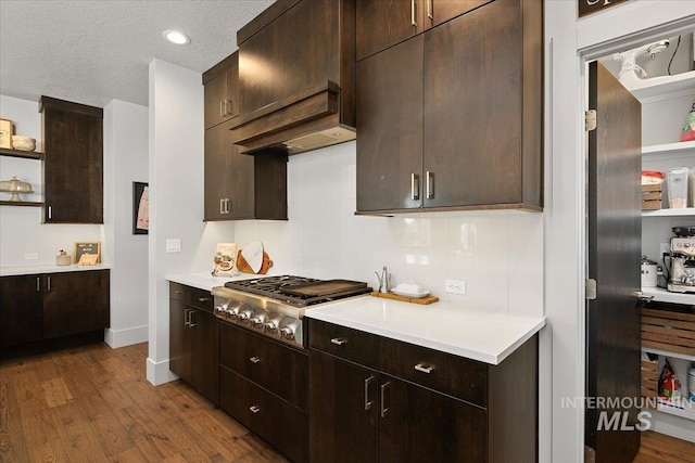 kitchen featuring open shelves, dark brown cabinets, and stainless steel gas cooktop