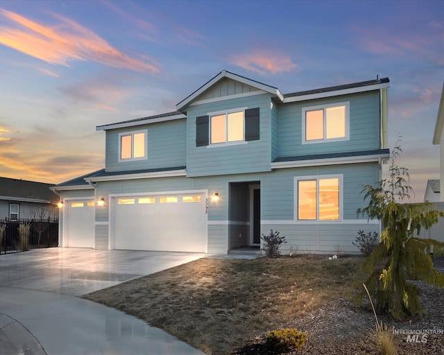 view of front of property with a garage