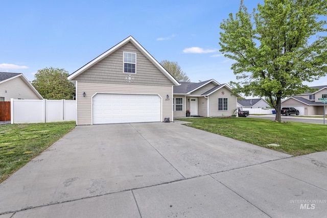 1517 Elm St N, Jerome, ID 83338 - view of front facade featuring an attached garage and driveway