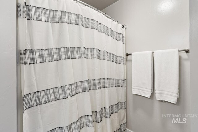 1873 W American Fork Dr, Meridian, ID 83642 - full bathroom with curtained shower