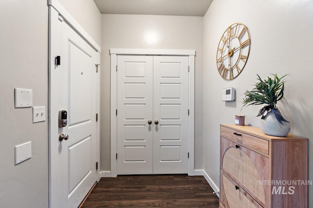 1873 W American Fork Dr, Meridian, ID 83642 - entryway featuring dark wood finished floors and baseboards