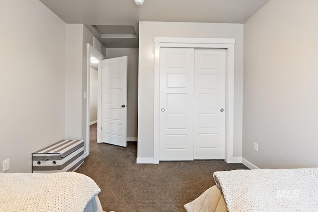 1873 W American Fork Dr, Meridian, ID 83642 - bedroom featuring dark colored carpet, a closet, and baseboards
