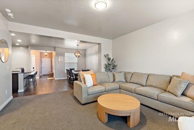 1873 W American Fork Dr, Meridian, ID 83642 - carpeted living area with baseboards and wood finished floors