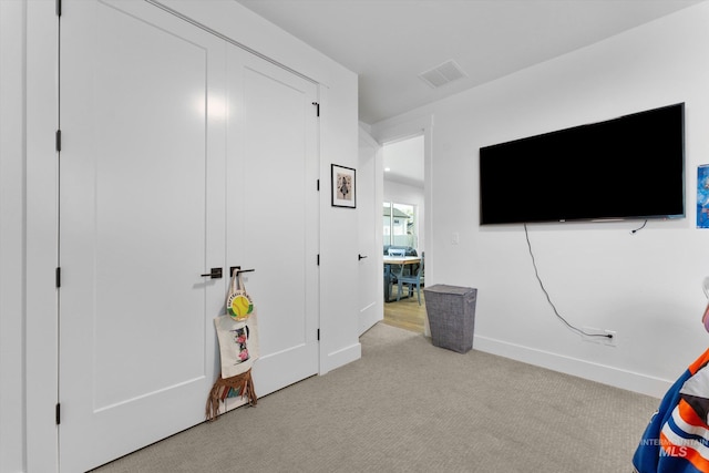 playroom featuring visible vents, carpet floors, and baseboards