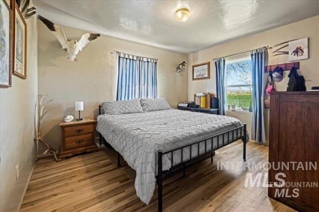 3845 S Powerline, Melba, ID 83641 - bedroom with wood finished floors