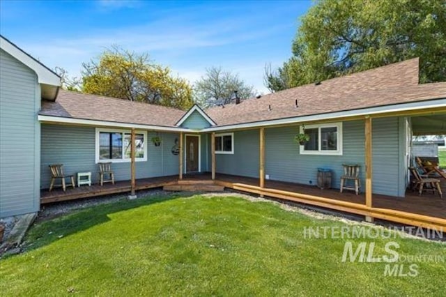3845 S Powerline, Melba, ID 83641 - rear view of property featuring a lawn and covered porch