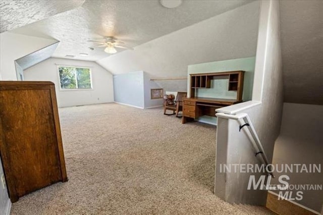 3845 S Powerline, Melba, ID 83641 - additional living space featuring vaulted ceiling, carpet flooring, ceiling fan, and a textured ceiling