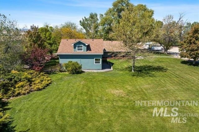 3845 S Powerline, Melba, ID 83641 - rear view of property featuring a lawn