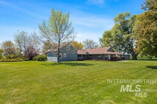 3845 S Powerline, Melba, ID 83641 - back of house featuring a lawn