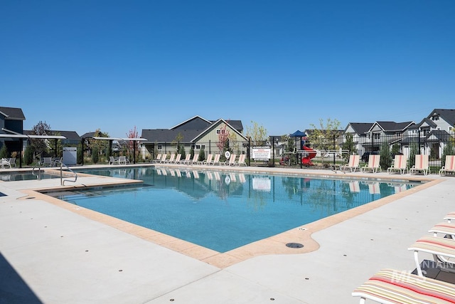 view of pool featuring a patio area