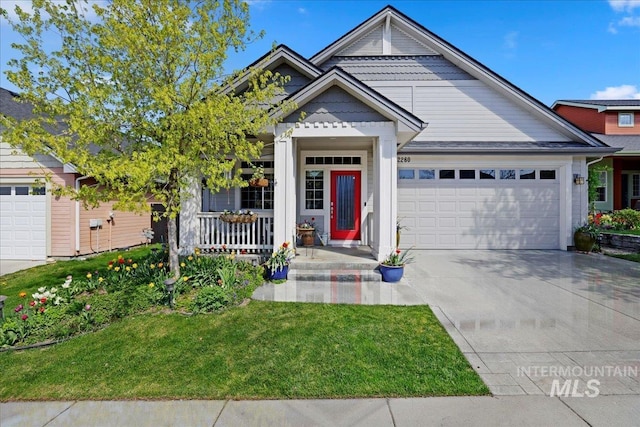 2260 N Eagle Creek Ln, Eagle, ID 83616 - view of front of house with a garage, a front yard, covered porch, and concrete driveway