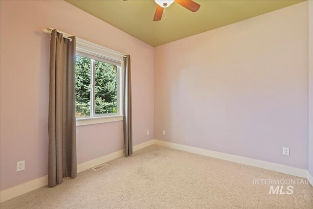 2260 N Eagle Creek Ln, Eagle, ID 83616 - carpeted empty room featuring ceiling fan and baseboards