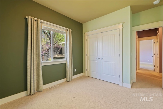 2260 N Eagle Creek Ln, Eagle, ID 83616 - unfurnished bedroom with carpet, a closet, and baseboards