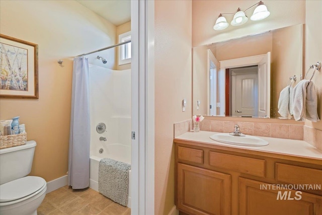 2260 N Eagle Creek Ln, Eagle, ID 83616 - bathroom with toilet, shower / tub combo with curtain, vanity, and baseboards