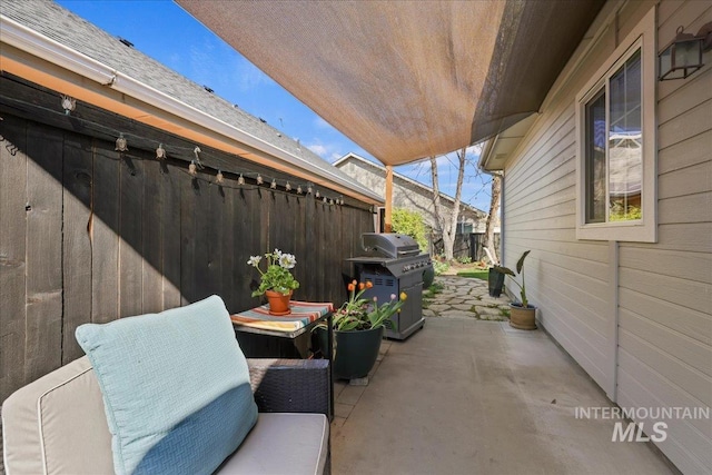 2260 N Eagle Creek Ln, Eagle, ID 83616 - view of patio / terrace featuring a grill and fence