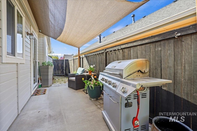 2260 N Eagle Creek Ln, Eagle, ID 83616 - view of patio featuring a fenced backyard and grilling area