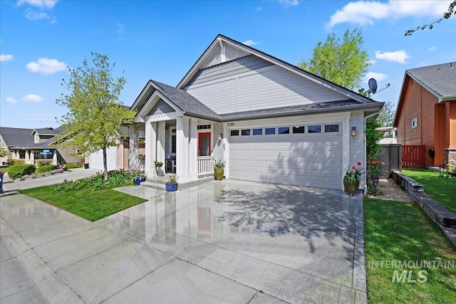 2260 N Eagle Creek Ln, Eagle, ID 83616 - single story home with driveway, an attached garage, and covered porch