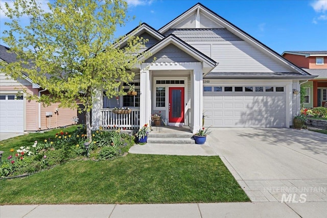 2260 N Eagle Creek Ln, Eagle, ID 83616 - view of front of property with a garage, driveway, a front yard, and a porch
