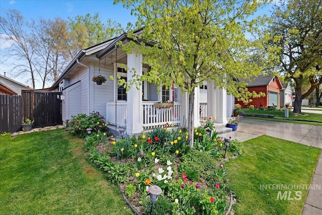 2260 N Eagle Creek Ln, Eagle, ID 83616 - view of front of house featuring covered porch, a garage, and driveway