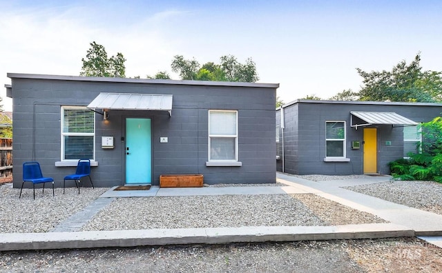 modern home with concrete block siding