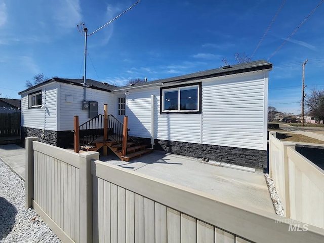 108 Morrison, Caldwell, ID 83605 - back of house featuring stone siding