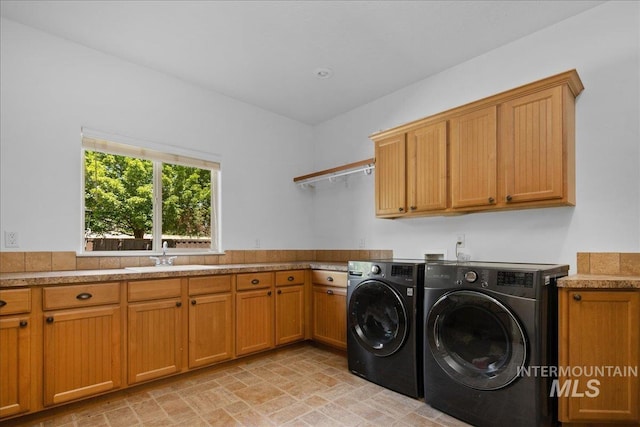 6370 E Escarpment Ct, Boise, ID 83716 - washroom with cabinet space and separate washer and dryer