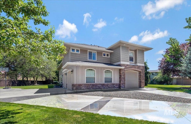 6370 E Escarpment Ct, Boise, ID 83716 - view of front of house featuring driveway, board and batten siding, a garage, and stone siding