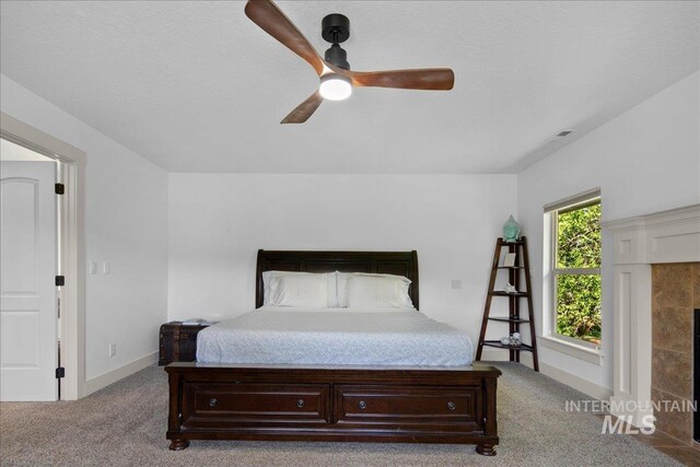 6370 E Escarpment Ct, Boise, ID 83716 - bedroom with carpet floors, a ceiling fan, and baseboards