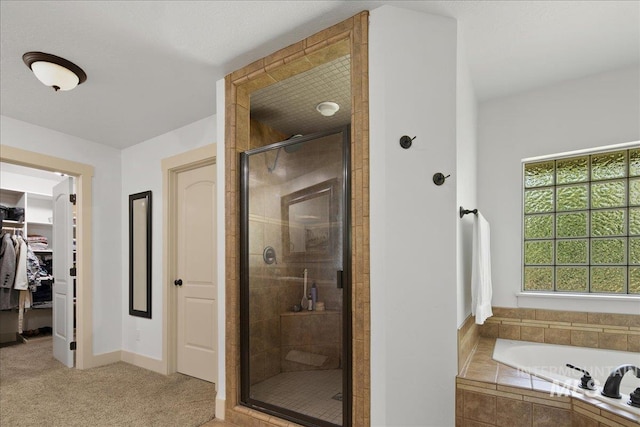 6370 E Escarpment Ct, Boise, ID 83716 - bathroom with a shower stall, a garden tub, and a spacious closet