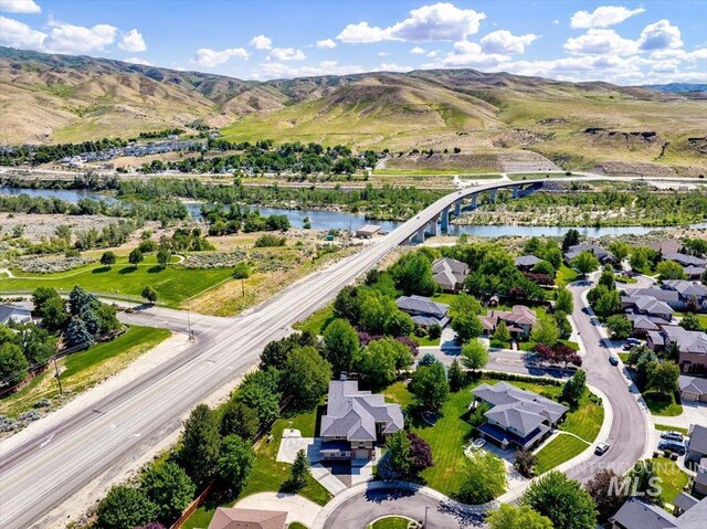 6370 E Escarpment Ct, Boise, ID 83716 - aerial perspective of suburban area with a water and mountain view