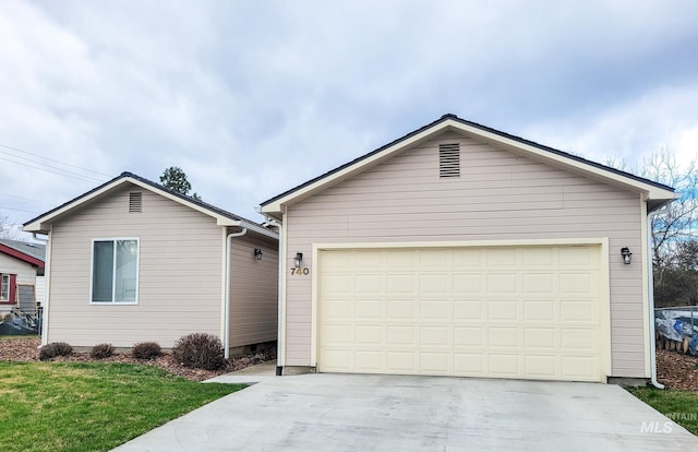 ranch-style house with an outbuilding and a garage