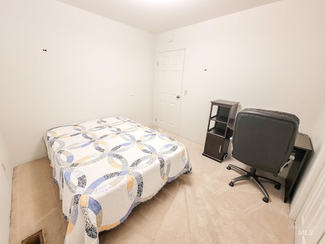 carpeted bedroom with visible vents