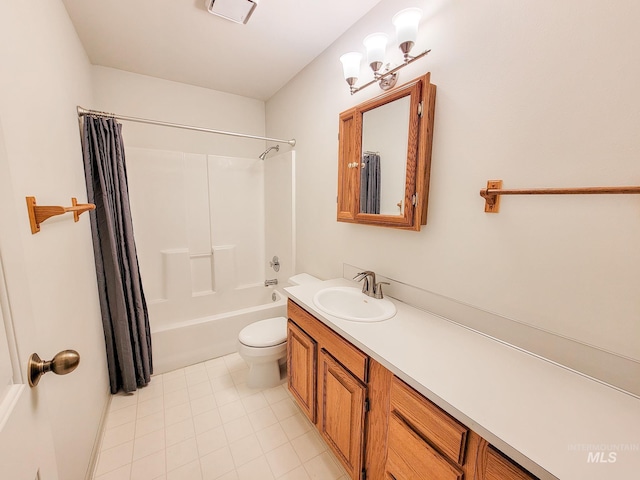 full bathroom with tile patterned flooring, toilet, shower / bath combo, a notable chandelier, and vanity