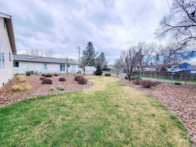 view of yard with fence