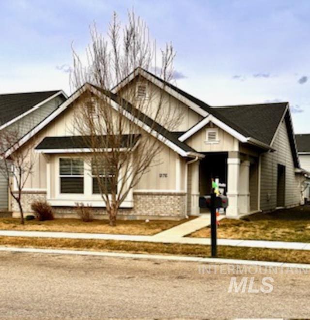 view of front of house featuring brick siding