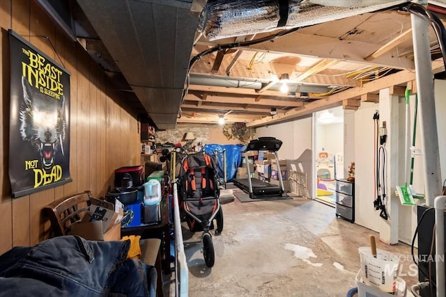unfinished below grade area with wooden walls