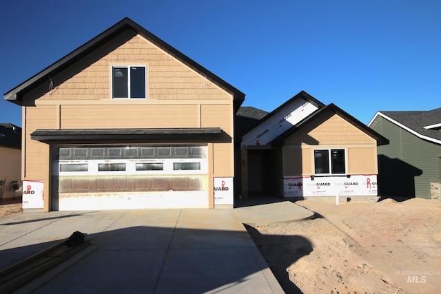 view of front of property featuring a garage