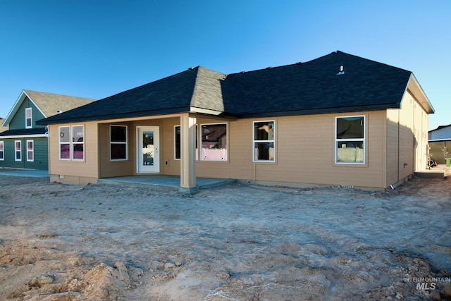 rear view of house featuring a patio area