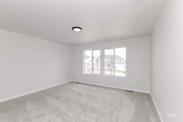 5391 S Memory Pl, Meridian, ID 83642 - carpeted empty room featuring baseboards