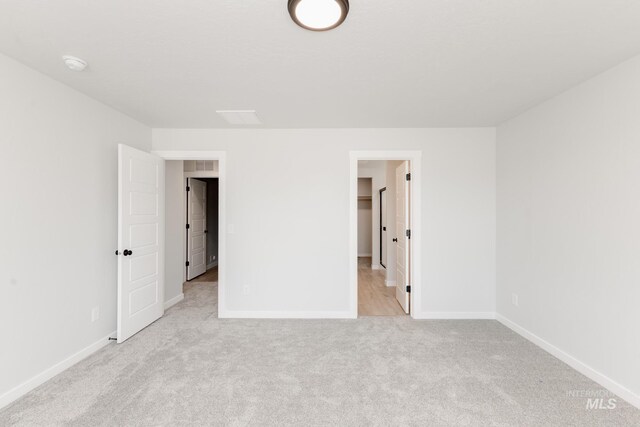 5391 S Memory Pl, Meridian, ID 83642 - unfurnished bedroom with light colored carpet, baseboards, and a spacious closet