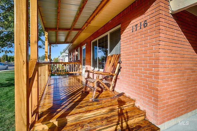 deck featuring covered porch