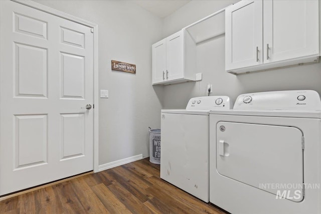 5915 N Lilybrook Pl, Boise, ID 83713 - laundry area with washer and clothes dryer, cabinet space, dark wood-style flooring, and baseboards