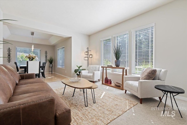 5915 N Lilybrook Pl, Boise, ID 83713 - living area with plenty of natural light, baseboards, and light colored carpet