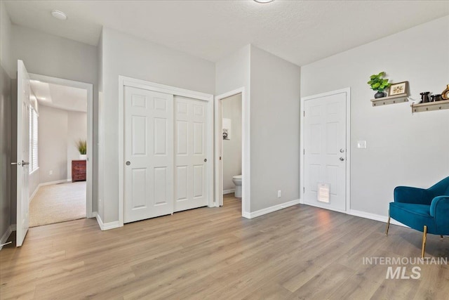5915 N Lilybrook Pl, Boise, ID 83713 - sitting room with light wood-style floors and baseboards
