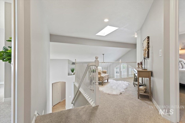 5915 N Lilybrook Pl, Boise, ID 83713 - hallway featuring a skylight, an upstairs landing, carpet, and lofted ceiling