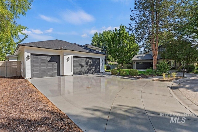 5915 N Lilybrook Pl, Boise, ID 83713 - view of front of house with a garage and driveway