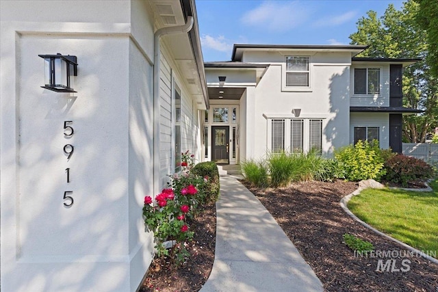 5915 N Lilybrook Pl, Boise, ID 83713 - doorway to property featuring stucco siding