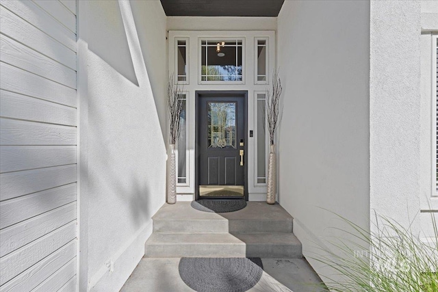 5915 N Lilybrook Pl, Boise, ID 83713 - doorway to property with stucco siding