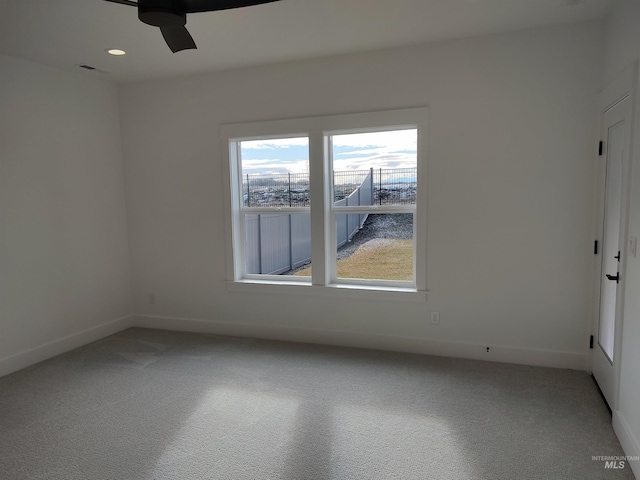 unfurnished room featuring ceiling fan