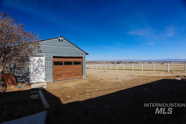 detached garage with fence